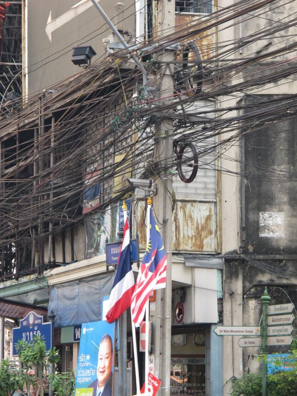 Bangkok Electricity with Flags, Signs and a Campaign Poster