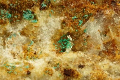 57 mm specimen showing Rosasite with sharp colourless crystals of hemimorphite to 2 mm, Roughton Gill, Cumbria
