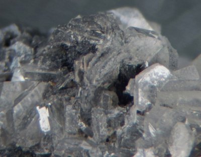 Leadhillite crystals to 2 mm, Whitwell Quarry, Whitwell, Derbyshire.  