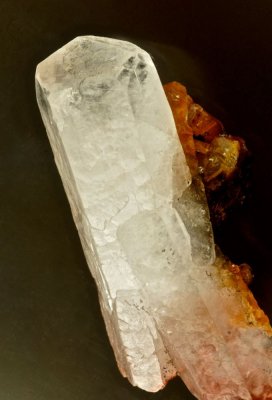 45 mm calcite prism, Egremont, Cumbria with 19th Century label. Originally attached to hematite at the base.