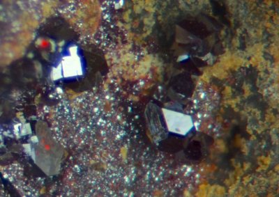 Brilliant cuprite microcrystals, Stonycroft Mine smelting site, Braithwaite, Cumbria. 