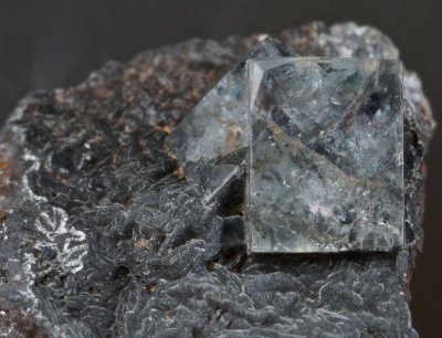Fluorite, ca 6 mm interpentrant twin with hexoctahedral corner on 16 mm matrix. Burtree Slitts, Cowshill, Weardale, Co Durham.