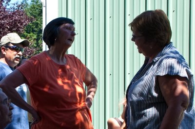 Exchange between cousins, Lou & Mary with Randy in back