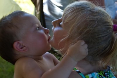 Zayden has a strong hold on Anna's hair