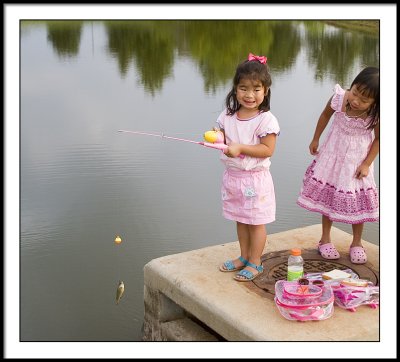 Fishing with her Barbie fishing pole