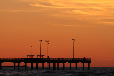 Pier Fishing at Sunrise