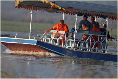 Others and Monks enjoying ride