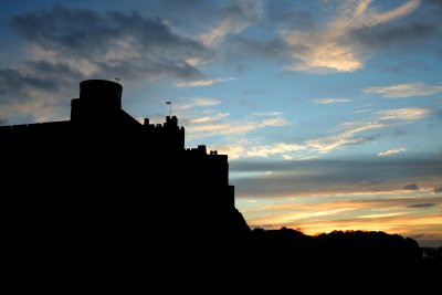 Sunrise behind Bamburgh Castle