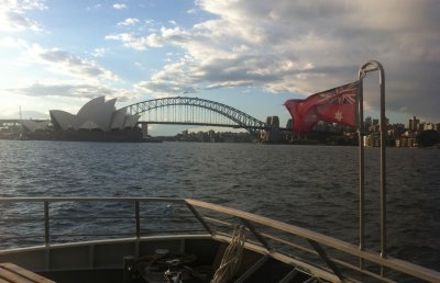 A Sydney Opera House & a red maritime Aussie flag