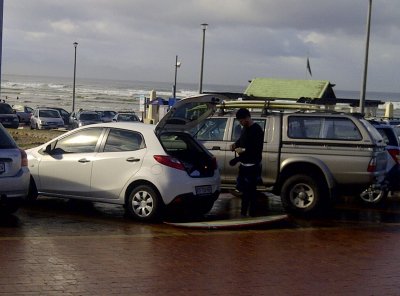 Getting ready to surf - Muizenberg Beach Parking Lot