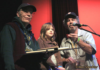 KZFR GM Rick Anderson (from left), guest raffle winner picker, and Noth Valley Production's Steve Schuman announce raflle winner