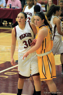 No. 31, McKenzie Dalthorp, tries to get position against the S.F State center
