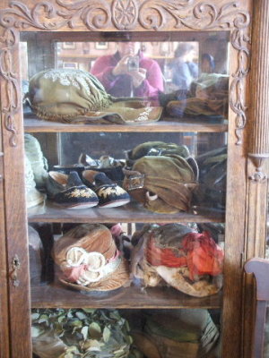 Bodie-museum display-a cabinet full of hats I couldn't get closer to