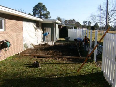 Working to remove the concrete and laying out the room size