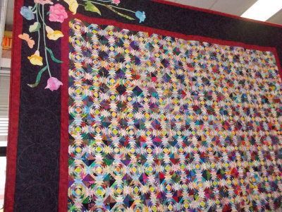 Huge quilt made of tiny pieces