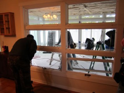 Unscrewing and removing each of the panes