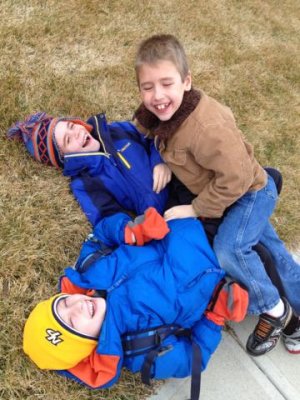 i love this pic- three buddies wrestling after they got off the school bus