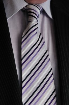 His purple striped tie