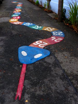 An invitation to play Hopscotch or Snakes and  Ladders