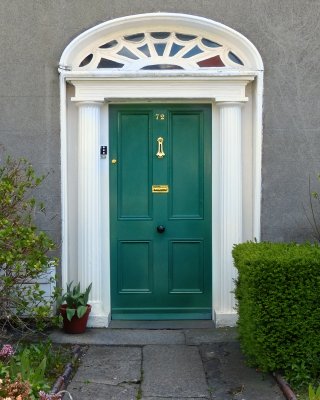 The classic green door of a friends house