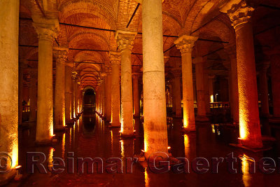 Water with fish and marble columns in the underground Basilica Cistern of Istanbul Turkey
