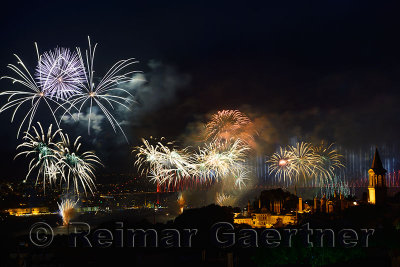 Republic Day fireworks on the Bosphorus with lights on the Bridge and Topkapi and Dolmabahce Palaces Istanbul