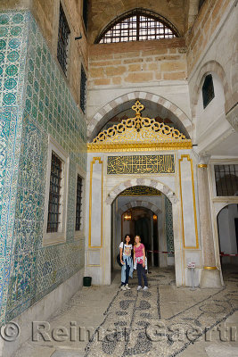 Two young female tourists at the Main Harem entrance Topkapi Palace Istanbul