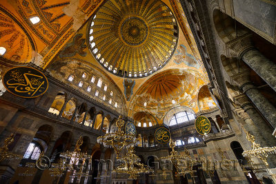 Golden domes frescoes and six winged Saraphim in the Hagia Sophia with chandeliers