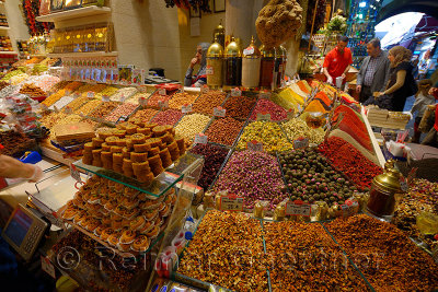 Turkish family shopping for dryed fruit in the Egyptian Spice Bazaar Istanbul