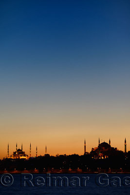 Red glow and blue sky after sunset over Blue Mosque and Hagia Sophia Istanbul