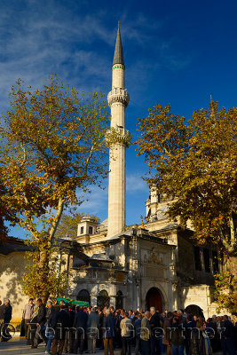 Green casket in funeral procession at Eyup Sultan Mosque in Istanbul Turkey