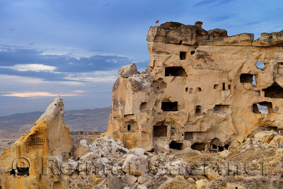 Cave dwelling in the abandoned ancient hilltop village of Cavusin in Cappadocia Turkey