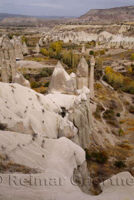 Fairy Chimneys in Love Valley Goreme National Park Turkey with Cavusin in the distance