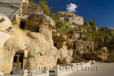 Construction development on volcanic tuff cave houses at Mustafapasa Cappadocia Turkey