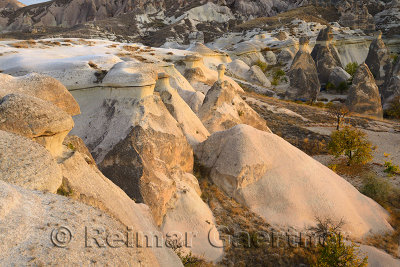 Smoothed volcanic tuff and Fairy Chimneys at Pasabag Monks Valley at sunset Cappadocia Turkey