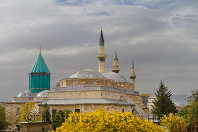 Tomb of Rumi at Mevlana Museum with Selimiye and Aziziye mosque minarets Konya Turkey