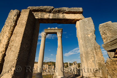 Stone door frame to the corner columns of the Agora at the Perge ruins Turkey