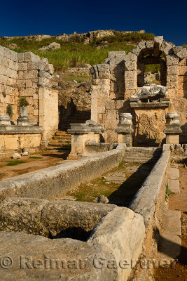 Nymphaeum water nymph monument fountain with River god Kestros at Perge archaeological site Turkey