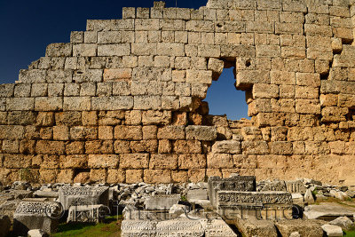 Ancient wall of the Roman Gate with carved stone at Perge near Antalya Turkey