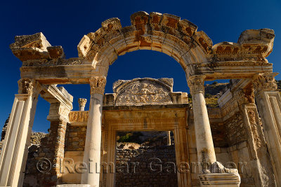 Ornate stone carving facade of the Temple of Hadrian with Tyche Goddess of the city of Ephesus Turkey