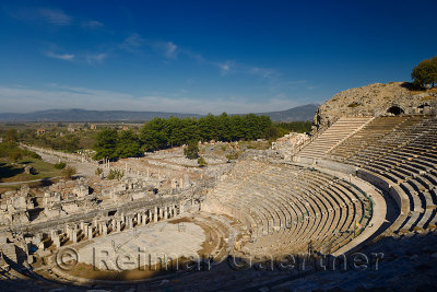 Morning sun on empty ruins of Ephesus theatre on Mount Panayir Turkey