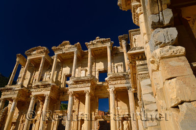 Ruins of the facade of the Library of Celsus from the Agora archway at ancient city of Ephesus Turkey