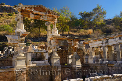 Ruins of the fountain of Emperor Trajan on Curetes street of ancient Ephesus Turkey