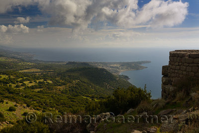 View east on the Aegean Sea coast from Assos Behramkale Turkey cliff top ruins