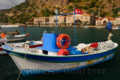 Fishing boats and hotels in the picturesque hamlet of Assos Iskele Turkey
