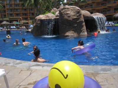 our 3 floaties and the happy face ball