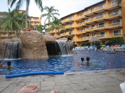 crazy kids jumping off the pool waterfall
