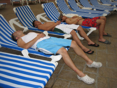 taking a nap after a long afternoon of laying out by the pool