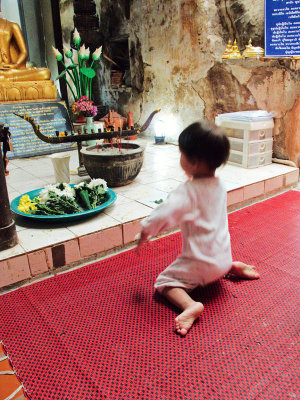 Youngster learning to pray