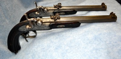 Angle View to Show Lockplate and Rear Barrel Sights